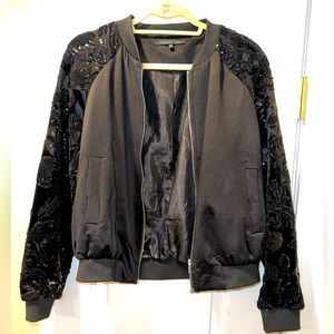 Black bomber with sequin sleave detail